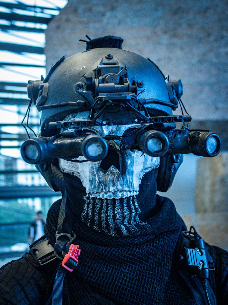 Operator in a skull mask with night-vision goggles